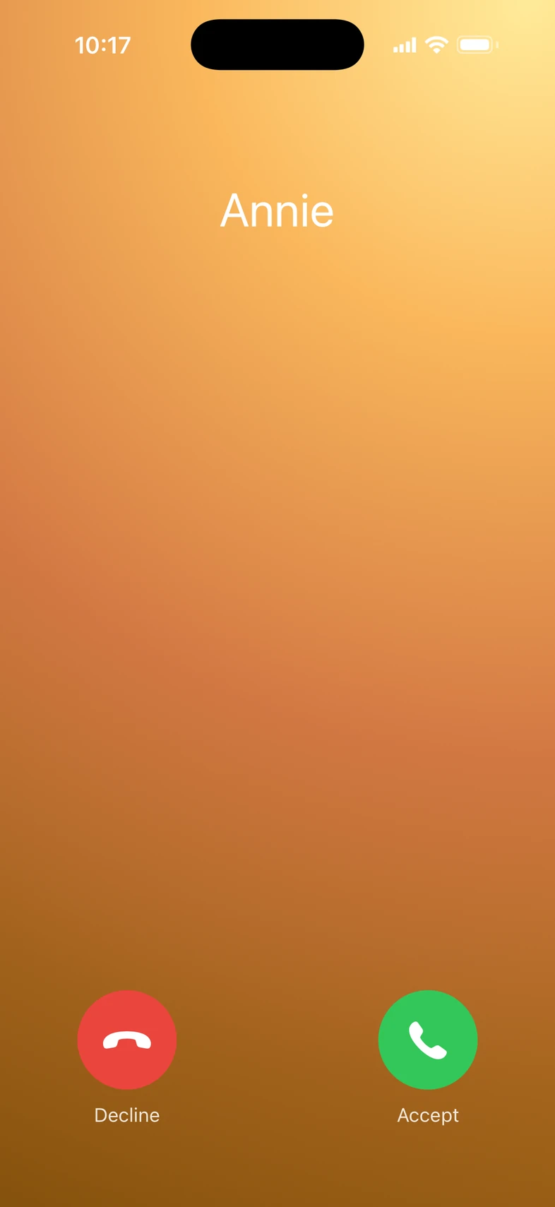 An incoming call over an orange gradient background.