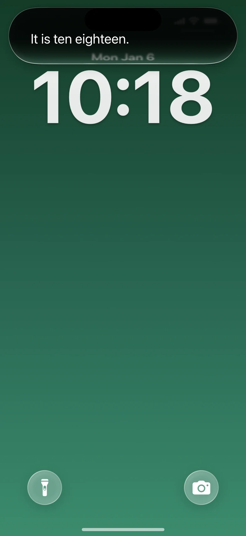 The scripted Siri response ‘It is ten eighteen.’ above the Lock Screen.